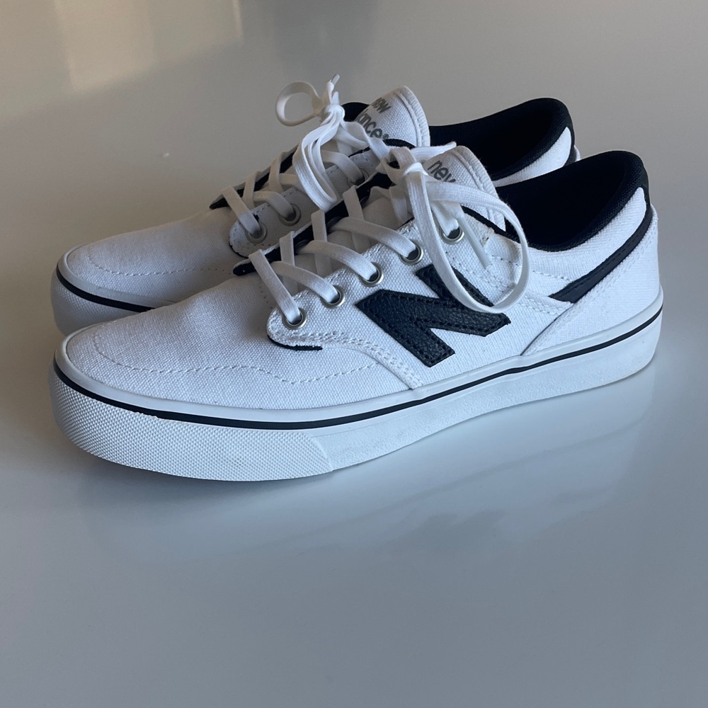 New Balance women's White and Black Sneakers